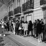 crowd on Irreal' sidewalk