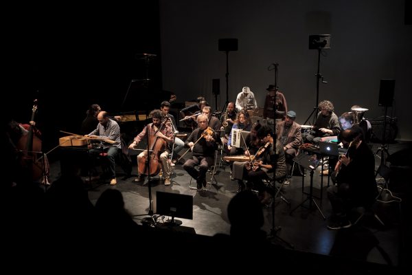 IKB Ensemble: Ernesto Rodrigues, Guilherme Rodrigues, Maria Do Mar, Miguel Almeida, Gianna de Toni, Abdul Moimême, Miguel Mira, Quentin Stokart, Andre Hencleeday, João Silva, Bruno Parrinha, Nuno Torres, Etienne Brunet, Paulo Curado, Pedro Frazão, Mariana Carvalho, Carlos Santos, Tom Malmendier, Biagio Verdolini & Monsieur Trindade